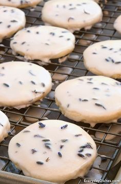 iced cookies with lavender sprinkles cooling on a wire rack in the oven