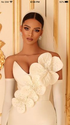 an image of a woman in white dress with flowers on her head and hands behind her back