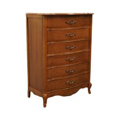 an antique chest of drawers with five drawers and four pulls on the front, in walnut wood