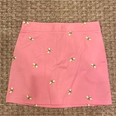 Size 4. J. Crew Bee Embroidered Pink Khaki Mini Skirt. Never Worn / Like New. Unlined. Zips In Back. Preppy Pink Cotton Skirt, Preppy Pink Cotton Skort, Pink Cotton Preppy Skort, Preppy Pink Mini Skirt For Summer, Pink Preppy Mini Skirt For Summer, Pink Embroidered Skirt, Fitted Pink Bottoms With Floral Embroidery, Cute Pink Cotton Skort, Spring Embroidered Cotton Mini Skirt