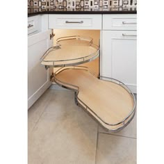 two wooden trays sitting on top of each other in a kitchen