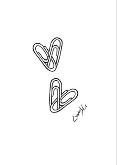 two paper clips with the word love written on them in cursive writing, one is black and white