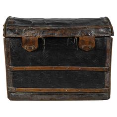 an old leather trunk is shown on a white background