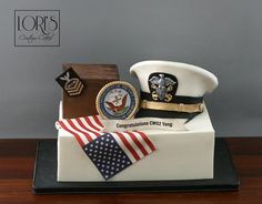 a cake made to look like an air force officer's hat and flag on top