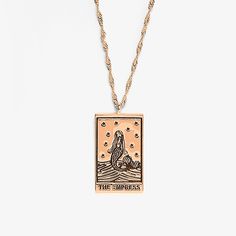 td {border: 1px solid #ccc;}br {mso-data-placement:same-cell;}Get a glimpse into your future with our Tarot Card Pendant Necklace. Available in two metal finishessilver and rose goldthis ready-to-layer style comes with a twisted rope chain and dangling tarot card pendant. Choose from the Lover, signifyingfinding harmony within yourself; the Star, symbolizinginspiration and renewed optimism; the Sun, foretelling good fortune and happiness; the Moon, representing intuition and imagination; and the Empress, symbolizing femininity and creative expression. (Or play your cards right and get all five!). Empress Tarot Card, Empress Tarot, Play Your Cards Right, Pura Vida Bracelets, The Lover, Layer Style, Rose Gold Metal, Rose Gold Necklace, Metal Necklaces