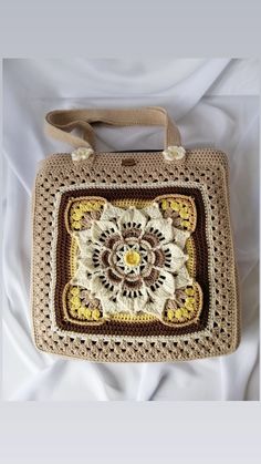 You can buy this bag from my store on Etsy. Cream Rectangular Crochet Bag, Cream Rectangular Crochet Bag For Everyday Use, Cream Crochet Rectangular Shoulder Bag, Square Beige Crochet Bag For Daily Use, Beige Square Crochet Bag For Daily Use, Handmade Cream Shoulder Bag, Beige Rectangular Crochet Bag With Granny Square, Cream Crochet Square Bag, Rectangular Crochet Bag In Beige With Granny Square