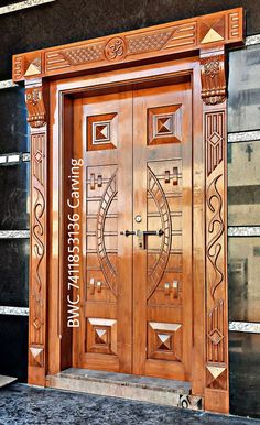 a wooden door with intricate carvings on the front and side panels inlayed to it