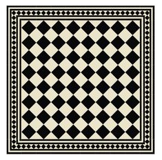 a black and white checkered rug with an intricate design on the bottom half of it