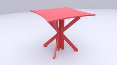 a red table sitting on top of a white floor