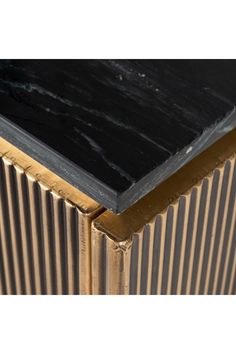 a black and gold radiator is shown against a white background with no image