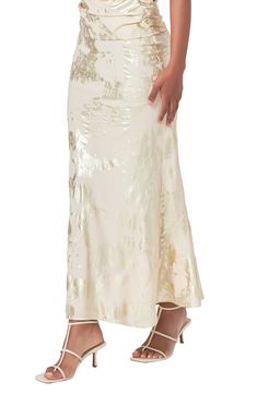 Glistening goldtone foil lends ethereal glamour to this head-turning skirt that gently flares out at the hem. Pull-on style Lined 100% polyester Hand wash, line dry Imported Elegant Flared Bottoms For Wedding, Gold Maxi Skirt For Summer Party, Elegant Gold Maxi Skirt For Evening, Glamorous Long Gold Skirt, Glamorous Gold Long Skirt, Elegant Gold Maxi Skirt For Summer, Spring Evening Flare Skirt, Flare Skirt For Spring Evening, Gold Fitted Maxi Skirt For Summer