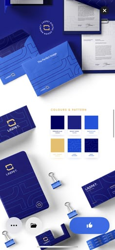 an assortment of business cards and stationery designed to match the brand's colors