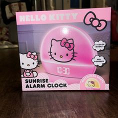 the hello kitty alarm clock is in its box