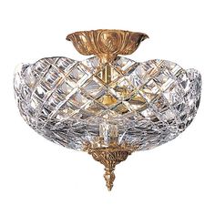 a golden ceiling light with crystal glass shades