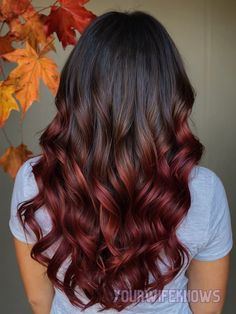 For brunettes with long hair, transitioning from a dark brown base to a deep red ombre can add a dramatic flair that’s both rich and captivating. This color choice is ideal for adding warmth and vibrancy, making your hair look like it’s been kissed by autumn leaves. I can’t wait to create this transition, ensuring the shift from brown to red is seamless and perfectly suited to your style. Dark Brown Red Ombre Hair, Red Brown Hair Ombre, Brown Into Red Ombre, Red Ombre On Brown Hair, Ombre Hair Red And Brown, Ombre Hair Brown To Red, Red And Dark Hair, Brown Hair With Red Ombre, Brown And Red Ombre Hair