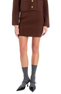 This knit miniskirt fashioned in a pencil silhouette is a season essential to elevate your day-to-night ensemble. 79% acrylic, 12% wool, 8% nylon, 1% spandex Hand wash, dry flat Imported Modern Fitted Pencil Skirt For Fall, Knit Pencil Skirt For Fall, Fitted Knit Bottoms Of Mini Length, Fitted Knit Mini-length Bottoms, Fitted Knit Skirt For Work, Fitted Knit Mini Length Bottoms, Fitted Solid Mini Skirt For Fall, Stretch Pencil Mini Skirt For Fall, Fall Stretch Pencil Mini Skirt