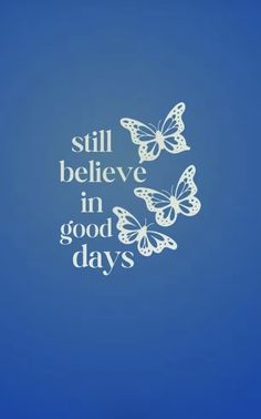 the words still believe in good days are shown on a blue background with white butterflies