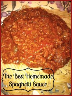 spaghetti and meat sauce on a colorful plate