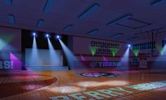 an empty gym with lights on the floor