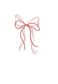 a red ribbon tied on top of a white wall in the shape of a bow