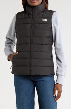 Experience the core warmth you need without restricting mobility in a lightweight puffer vest insulated with a blend of down and recycled polyester. 25 1/2" length (size Medium)   50-denier, 73 g/m² recycled polyester   Durable water-repellent (DWR) finish   Lined, with 50% 600-fill-power down, 50% recycled-polyester fill   100% recycled polyester   Machine wash, line dry   Imported   PFC-free, durable water-repellent coating is free of per- and poly-fluorinated chemicals, some of which can be h Black Puffer Vest, 60 Fashion, Wool Vest, Outerwear Vest, Quilted Vest, Down Vest, North Face Women, Puffer Vest, Best Brand