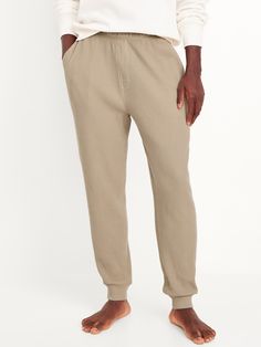 elastic waistband faux fly hip pockets rib-knit cuffs pull-on style relaxed thigh tapered leg 29" regular inseam 31" tall inseam model is approx.  6'1" and wears size m (32w)machine wash according to the care instruction label  . Best Holiday gift for Men , perfect Joggers for Christmas! Beige Loungewear, Holiday Gifts For Men, Cozy Lounge, Old Navy Men, Family Pajamas, Knit Set, Big And Tall, Knit Cuff, Waffle Knit