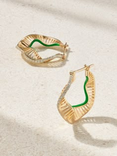 L'Atelier Nawbar's earrings have a twisted silhouette inspired by the ripples of the oceans surface. Made from 18-karat gold, they're hand-painted with malachite-inspired green enamel along in the interior of the open silhouette, while rows of diamonds trace the outer edge. Minimalist Silver Jewelry, Ring Texture, Water Jewelry, Wave Jewelry, Silver Jewelry Accessories, Inlaid Jewelry, Let It Flow, Design Library, Luxury Earrings