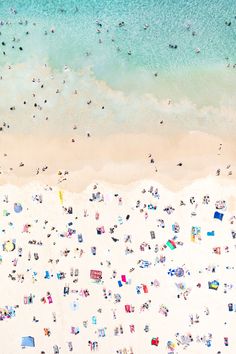 an aerial view of people at the beach