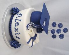 a cake decorated with blue and white frosting