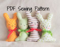 four stuffed animals sitting next to each other on top of a white sheet with the words pdf sewing pattern