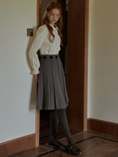 This product is an Autumn Grid Woolen Pleated Skirt, meticulously designed to showcase a blend of classic style with a preppy twist. The skirt features sharp pleats that provide a structured yet flowy movement, and it's accentuated with a detailed grid pattern that offers a textured visual appeal. It's finished with a clean waistband, enhancing the skirt's elegant form while ensuring a comfortable fit.This Autumn Grid Woolen Pleated Skirt boasts precise pleating, which creates a timeless, sophis Skirt Movement Reference, Fall Pleated School Uniform Bottoms, Pleated School Uniform Bottoms For Fall, Fall School Uniform Style Pleated Bottoms, Fall School Uniform Pleated Bottoms, Fall School Uniform Style Pleated Skirt, School Uniform Style Pleated Skirt For Fall, School Uniform Style Pleated Skirt For Work, Classic Pleated Hem Mini Skirt