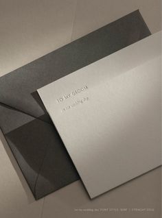 an envelope with the words i am my groom on it is opened to reveal a piece of paper