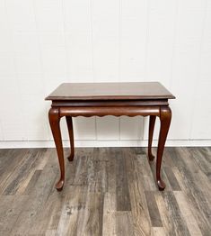 Elegant Early American Style side Tea table with pull out shelves and Queen Anne style legs making it the perfect multi-purpose reading table for a tea lounge or small guest room. Condition  is fair. The table is attractive and sturdy. The top has some water rings and would need refinishing or painting. SHIPPING is not free for this item. Please message with a zip code and I can get you a shipping quote.  Measurements:  Height 24.5 inches   Depth 18 inches   Width 18 inches Small Guest Room, Style Side Table, Early American Style, Tea Lounge, Queen Style, Reading Table, Scalloped Skirt, Pull Out Shelves, Water Rings