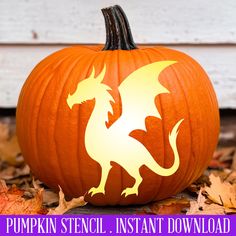 a pumpkin with a dragon carved on it