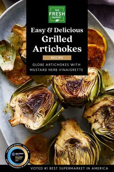 an image of grilled artichokes on a plate