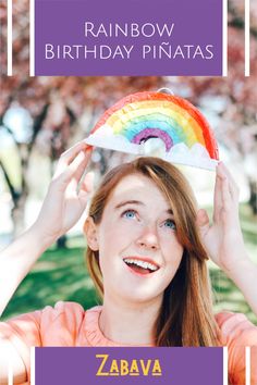 a girl with a rainbow birthday pinata on her head and the words zabava above her head