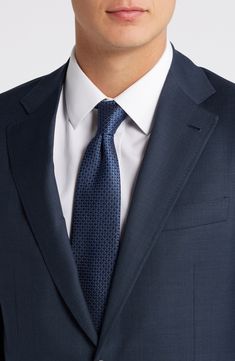 Navy wool brings polish and distinction to a suit that's tailored with traditional detailing and styled to make a versatile addition to any formal wardrobe. 31" length (size 54EU) Jacket has notched lapels; chest pocket; flap pockets; interior pockets; side vents Cuff buttons may not be attached. Jackets purchased at full price can have the sleeve length customized for free at your local Nordstrom Trousers have zip fly; slant pockets; back button-welt pockets Jacket is lined 100% wool Dry clean Luxury Blue Ties For Business, Classic Tailored Suit With Tie, Designer Navy Blazer For Business, Classic Silk Business Blazer, Classic Silk Blazer For Business, Classic Formal Suits With Ties, Classic Silk Suits With Notch Lapel, Timeless Silk Suits For Business Casual, Luxury Wool Three-piece Suit For Formal Occasions