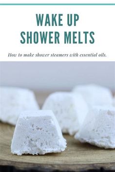 white marshmallows on a wooden plate with text that reads, wake up shower melts how to make shower steamers with essential oils