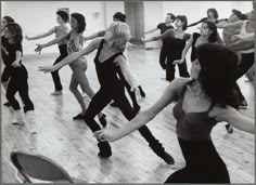 a group of women dancing in a dance studio