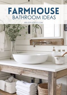 a bathroom with white fixtures and wood accents, including a large bowl sink in the center