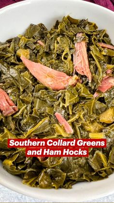 a white bowl filled with collard greens and ham hocks