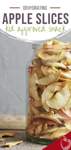 an apple slices in a glass jar with the title, dehydrating apple slices kid approved snack