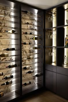 a wine cellar with many bottles in it