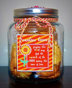 a jar filled with cookies on top of a table