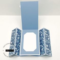 a blue and white box sitting on top of a table