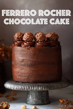 a cake with chocolate frosting and nuts on top is shown in front of the words ferreto rocher chocolate cake