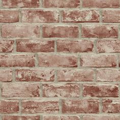 a brick wall that is made out of red bricks