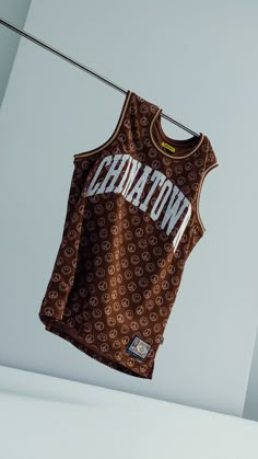 a basketball jersey hanging on a clothes line