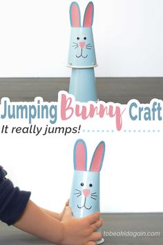 a child is playing with some bunny crafts