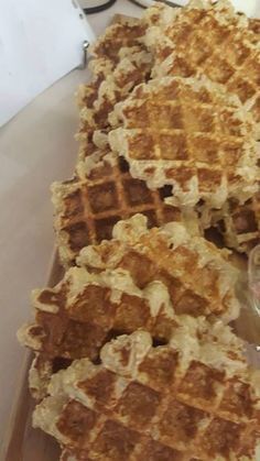 some waffles are sitting on a cutting board